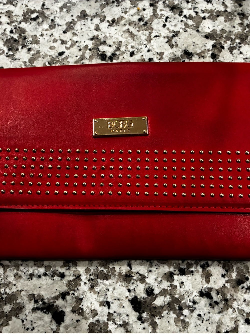 BCBG Red Fold-Over Clutch with Gold Stud Accents
